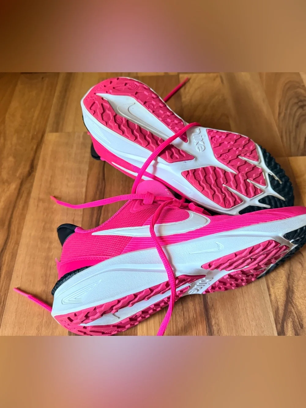 Nike Vibrant Pink Running Shoe with White Swoosh